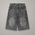 Short en Jean Wide Leg BTY sur fond studio béton.